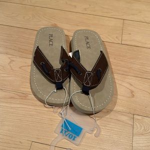NWT Kids flip flops.